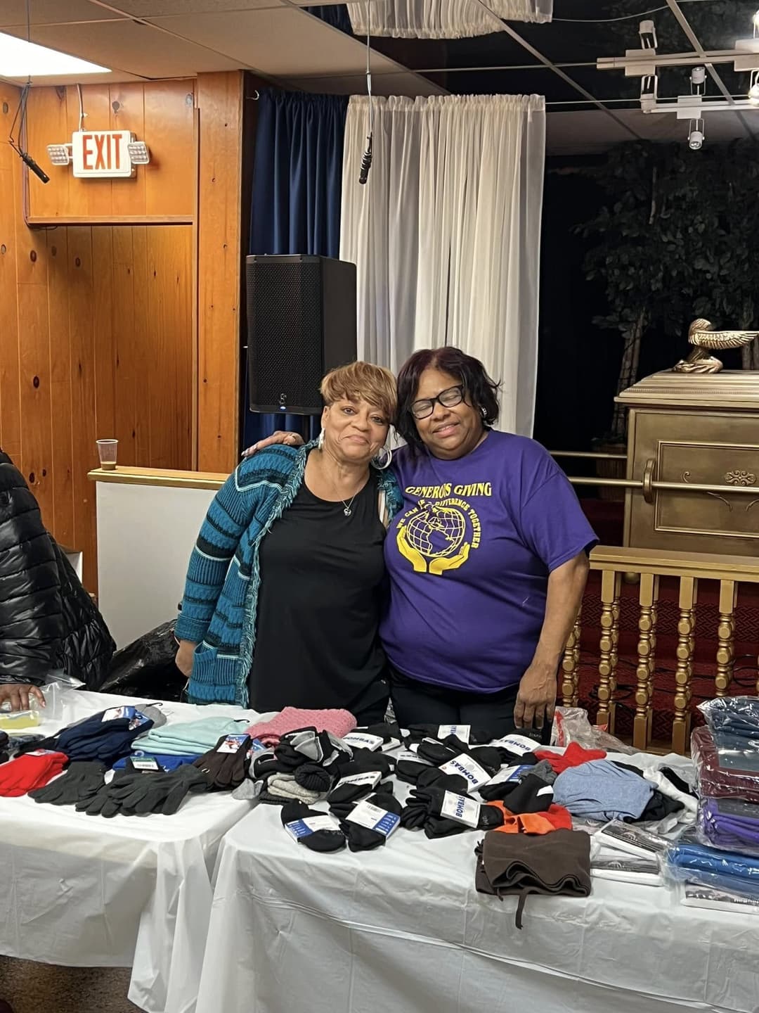 Karen with church member at Christmas distribution