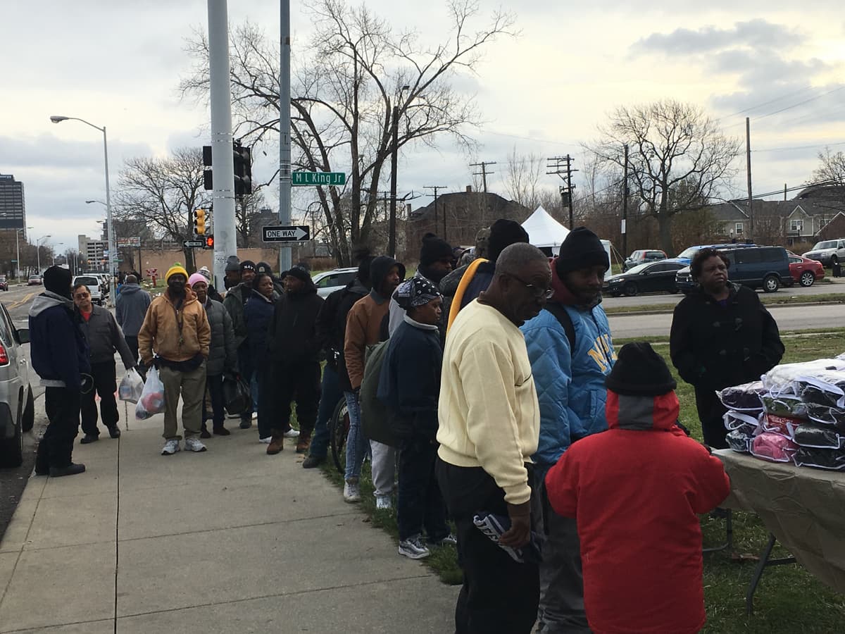 Community lined up on MLK street for blanket distribution